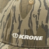 Image of a camo hat with white Krone logo