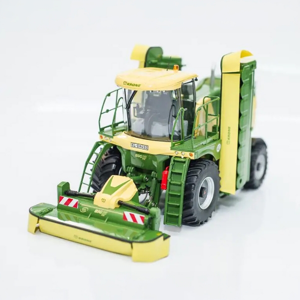 Detailed green and yellow mower model with folding side mowers