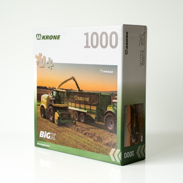 1000‑piece puzzle box featuring forage harvester and wagon at sunset