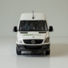 Toy‑sized service vehicle with printed equipment icons displayed in profile